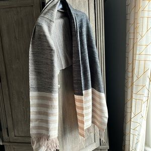 Neutral-colored scarf.